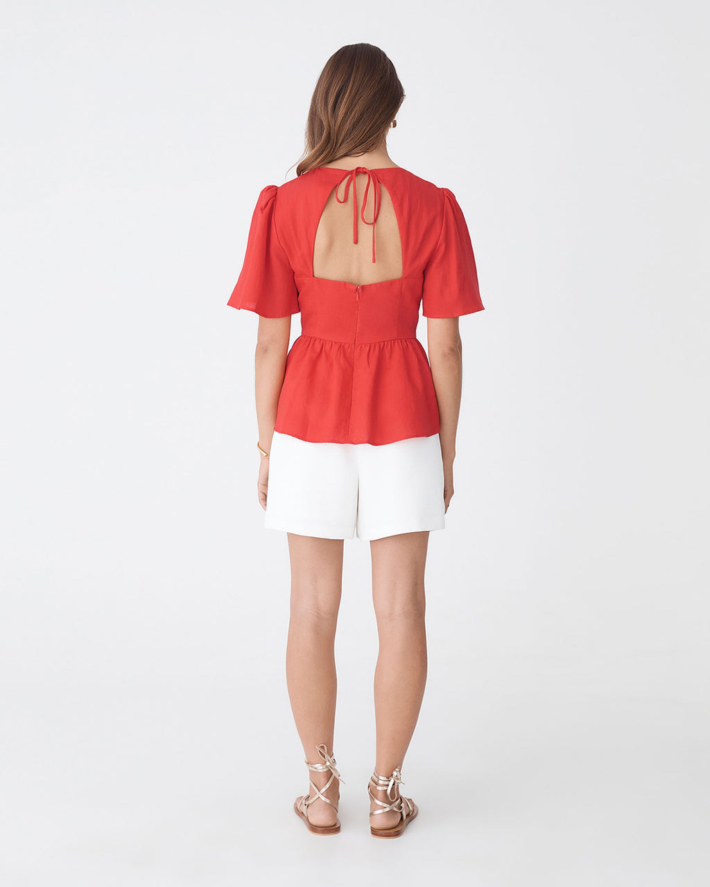 Jade Linen Peplum Top in red — back view 2