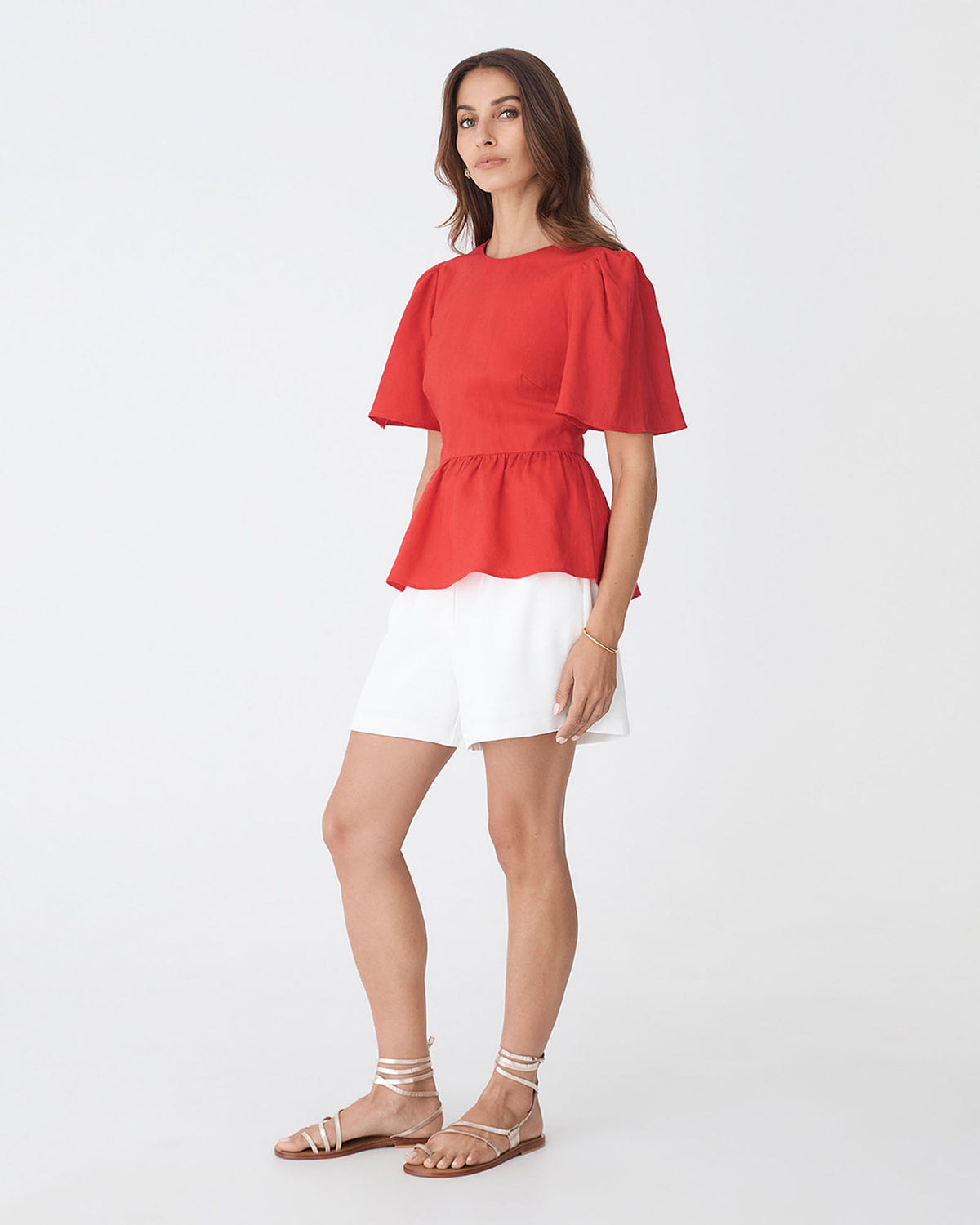 Jade Linen Peplum Top in red — side view
