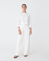 Emma Button Back Linen Top in white — full-length view