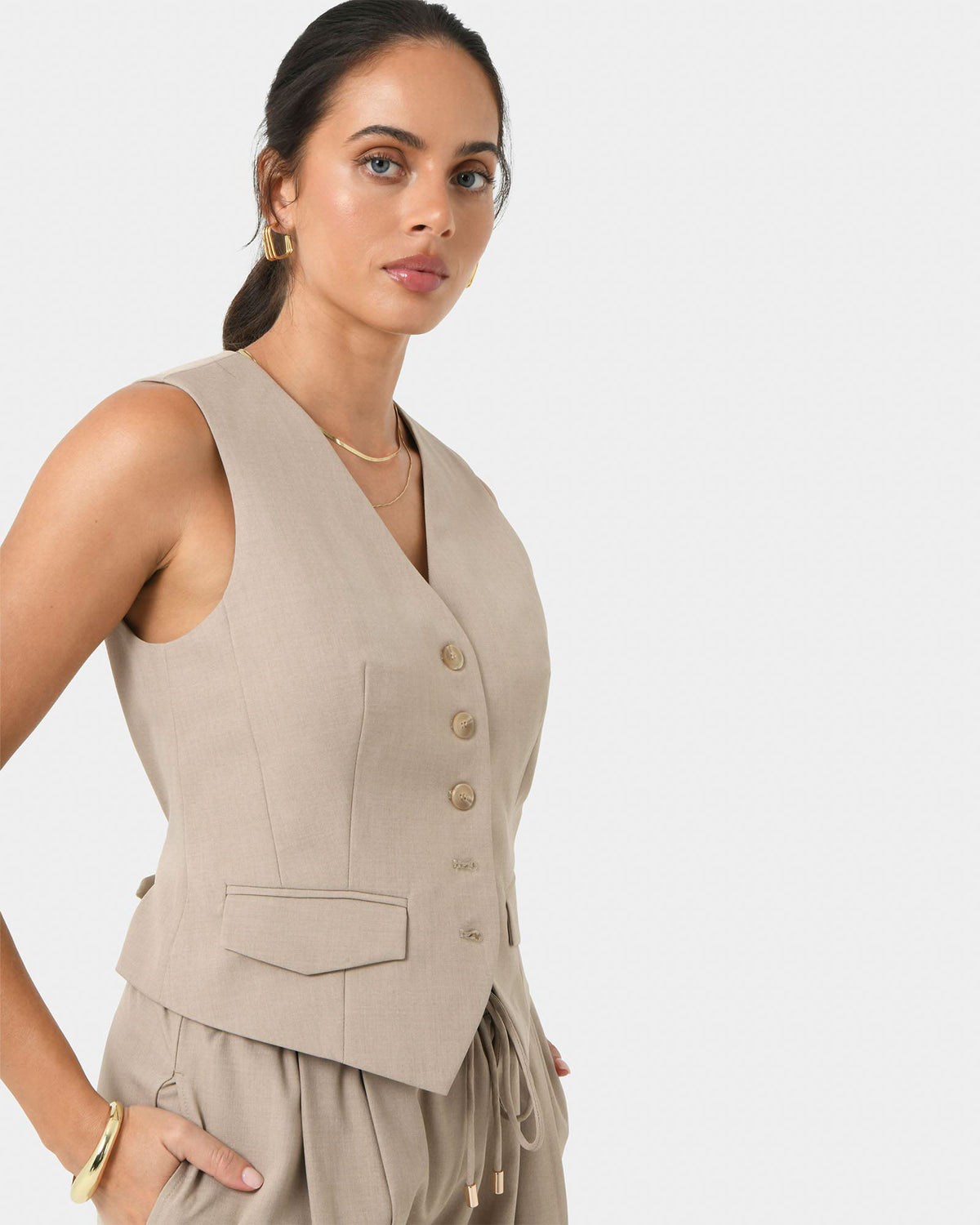Abel Tailored Vest in sand — close-up view