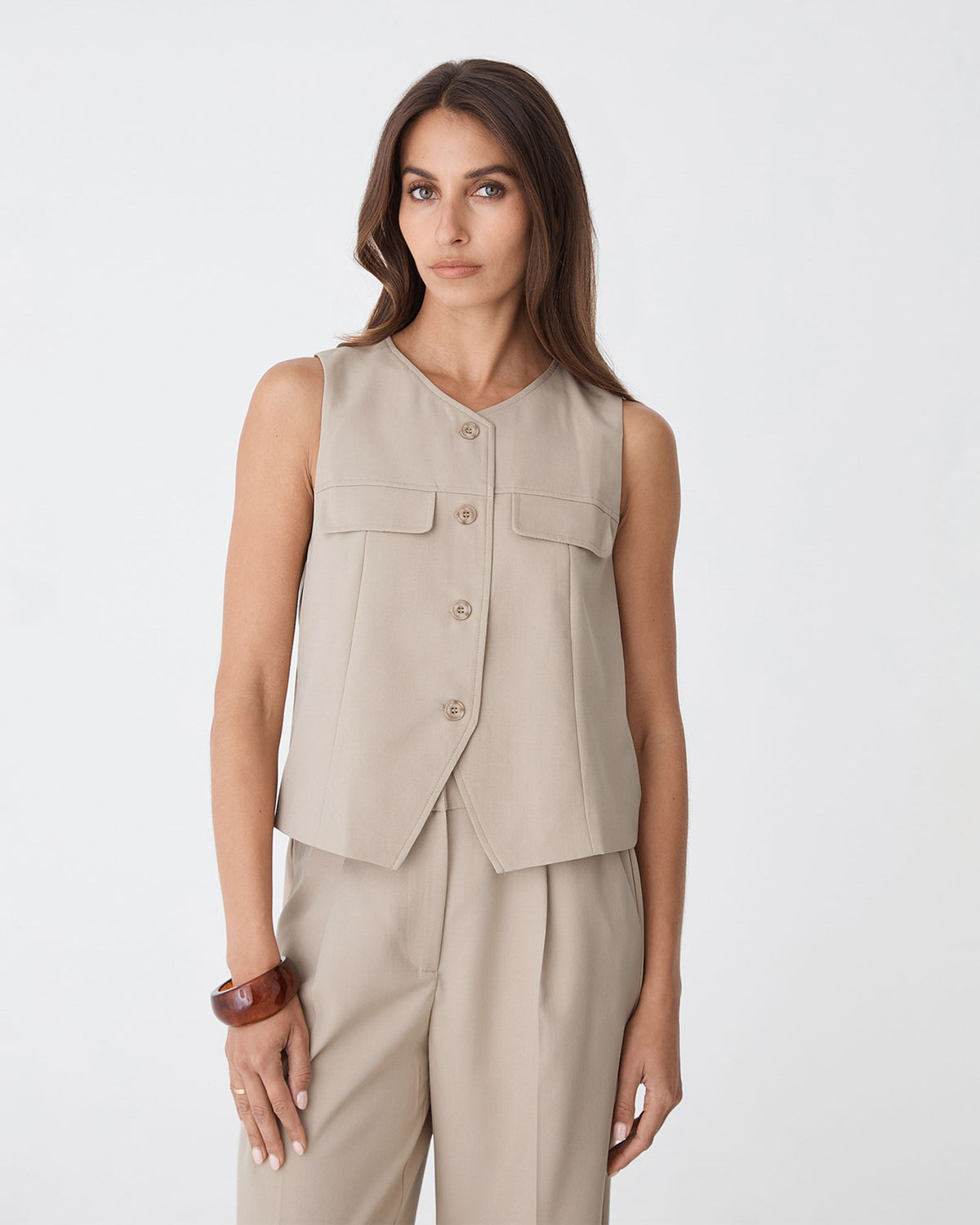 Abel Relaxed Pocket Vest in oat — close-up view