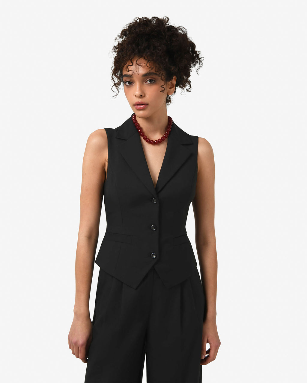 Amera Collared Vest in black — close-up view