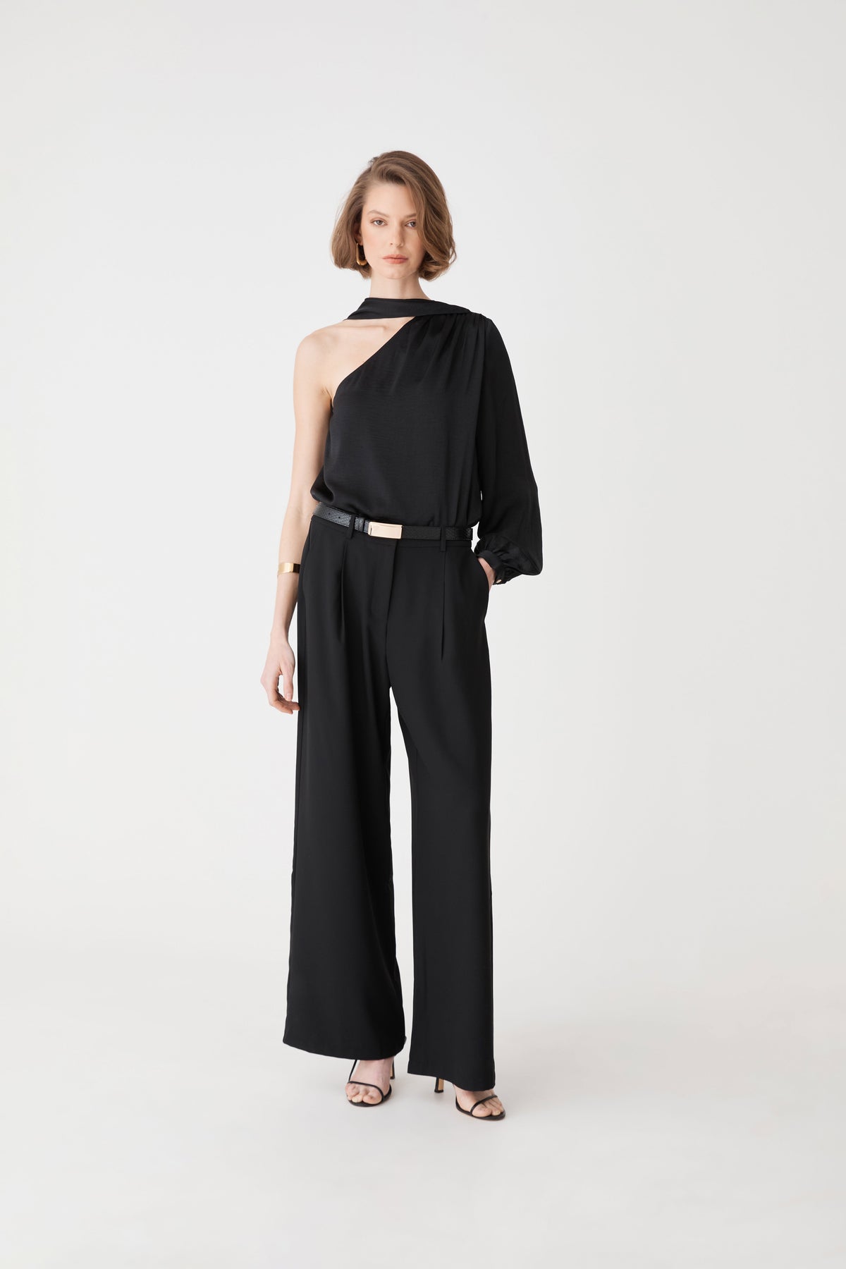 Daphne Pleated Crepe Pants in black — full-length view