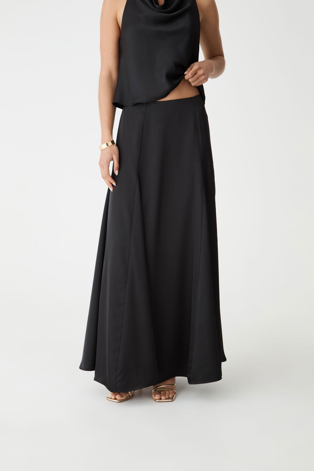 Freya Satin Godet Skirt in black — close-up view