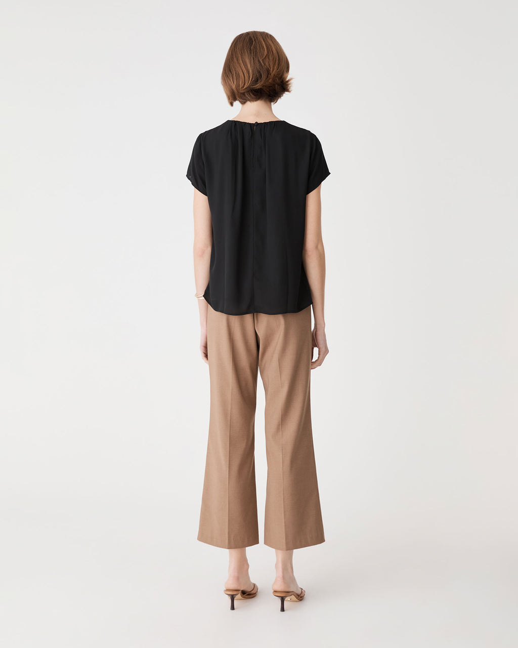 Angela Gathered Neck Top in black — back view