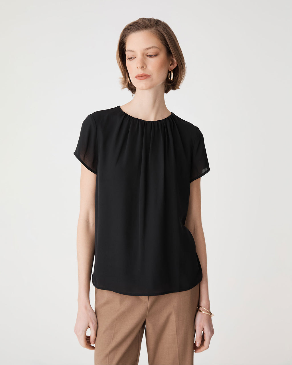 Angela Gathered Neck Top in black — close-up view