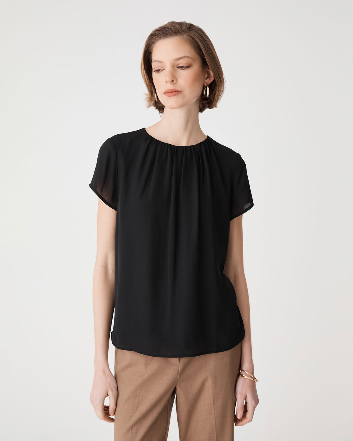 Angela Gathered Neck Top in black — close-up view