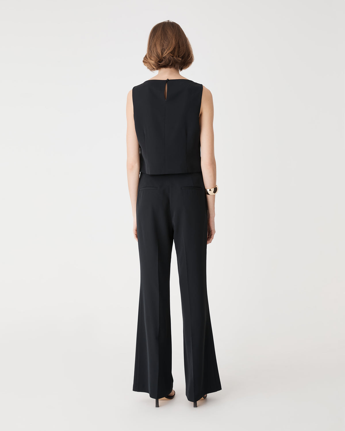 Chelsea Sleeveless Top in black — back view