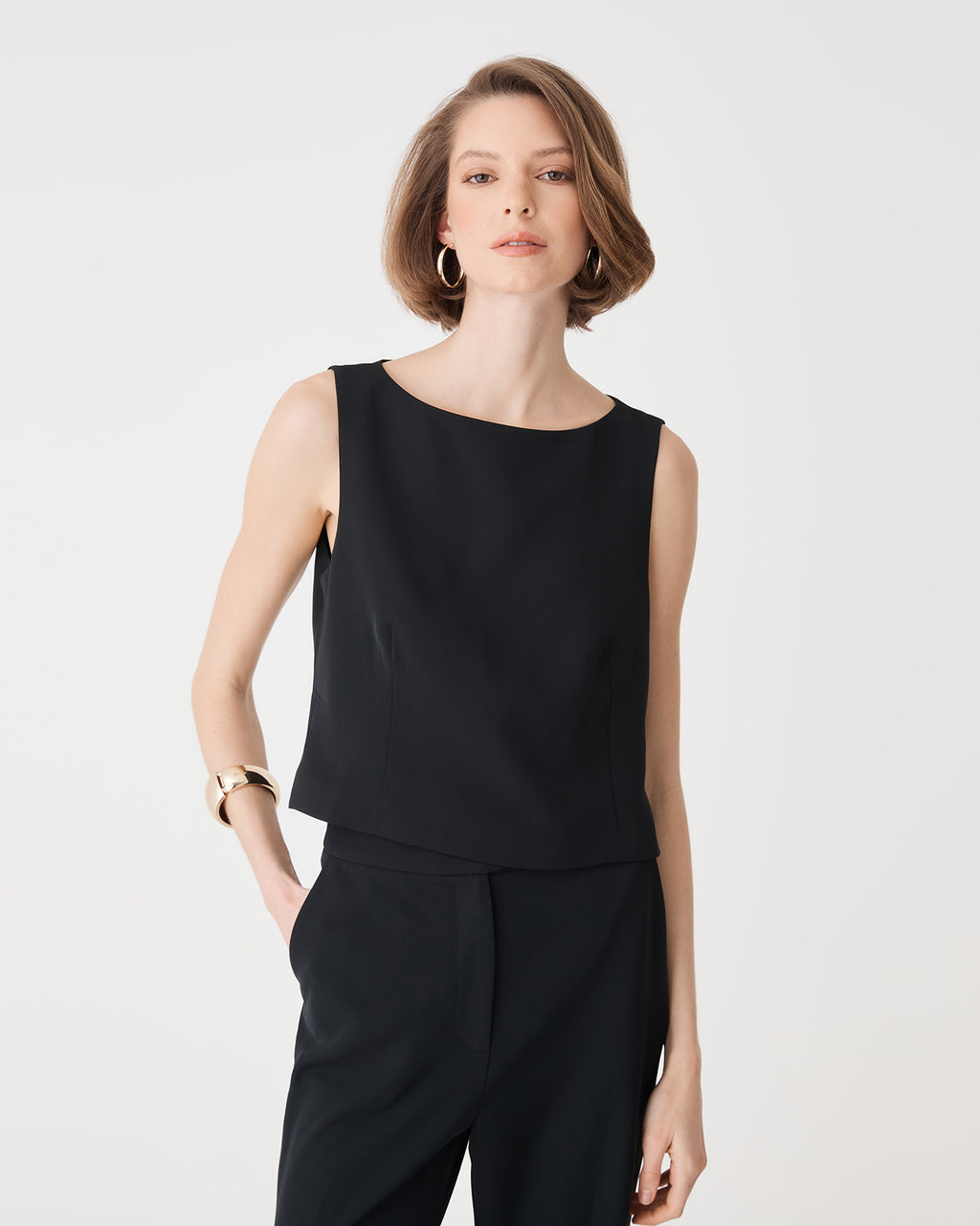 Chelsea Sleeveless Top in black — close-up view
