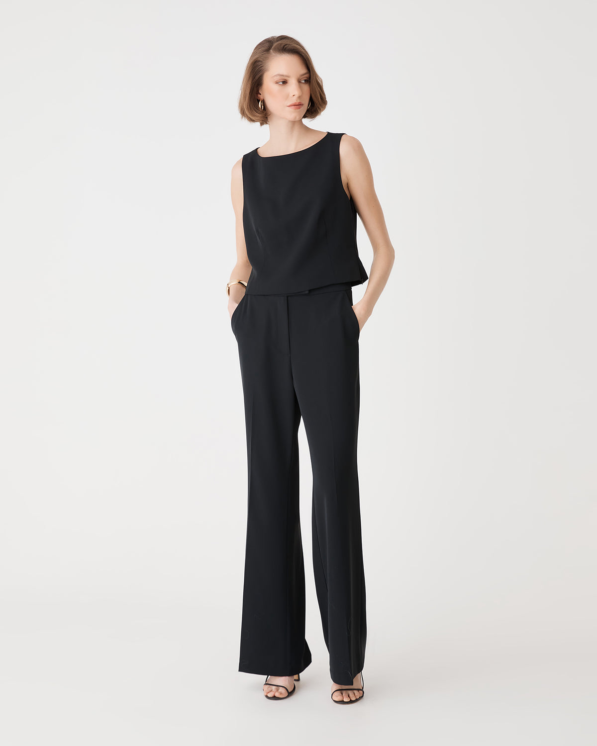 Chelsea Sleeveless Top in black — full-length view