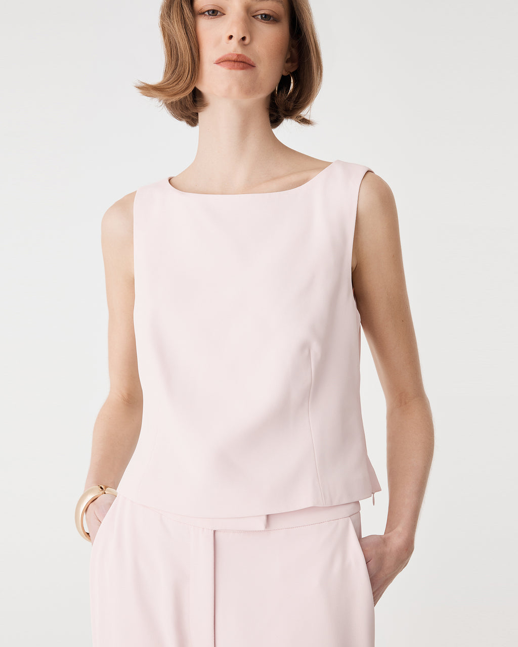 Chelsea Sleeveless Top in petal pink — close-up view