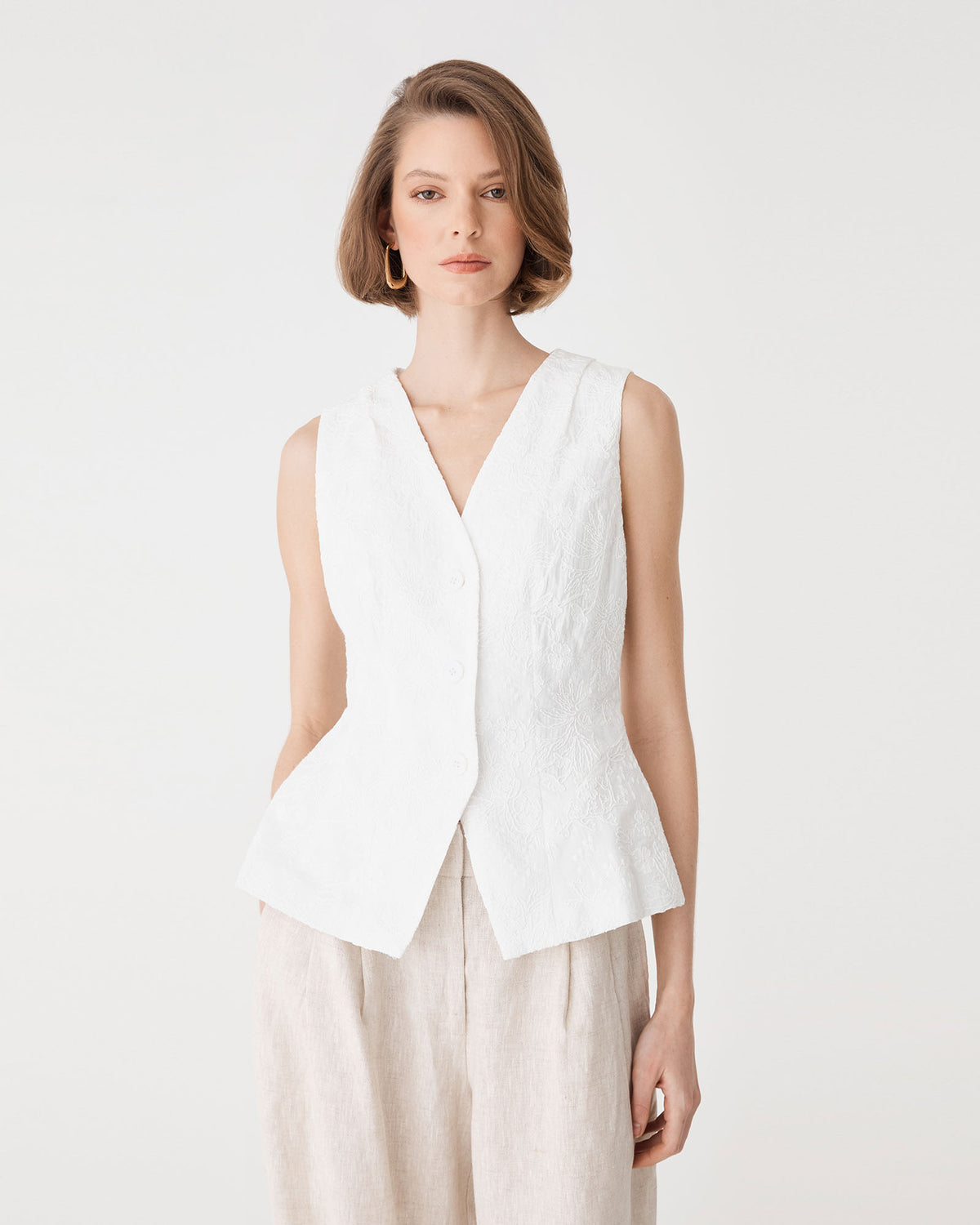 Eloise Embroidered Top in ivory — close-up view