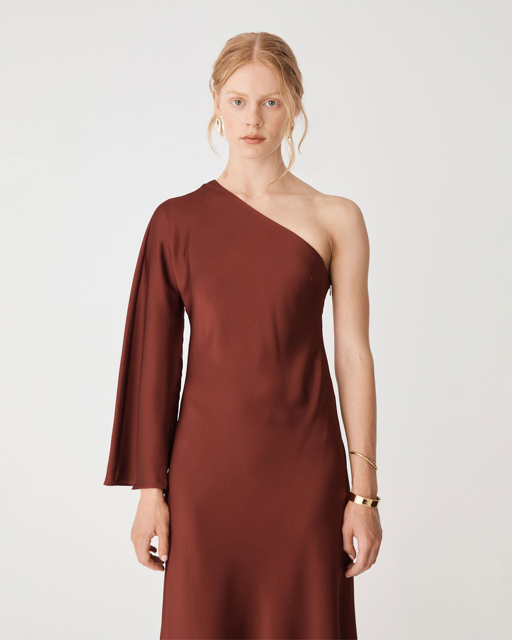 Cleo One Shoulder Satin Dress in brick — close-up view