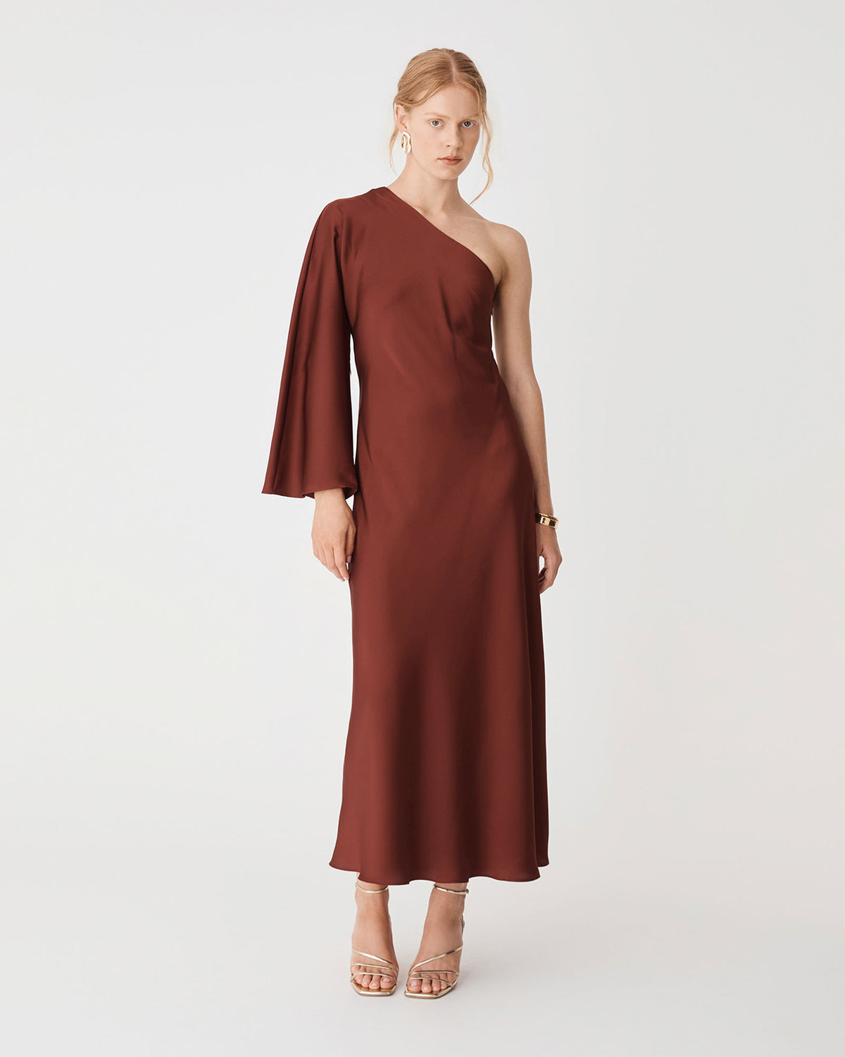 Cleo One Shoulder Satin Dress in brick — full-length view