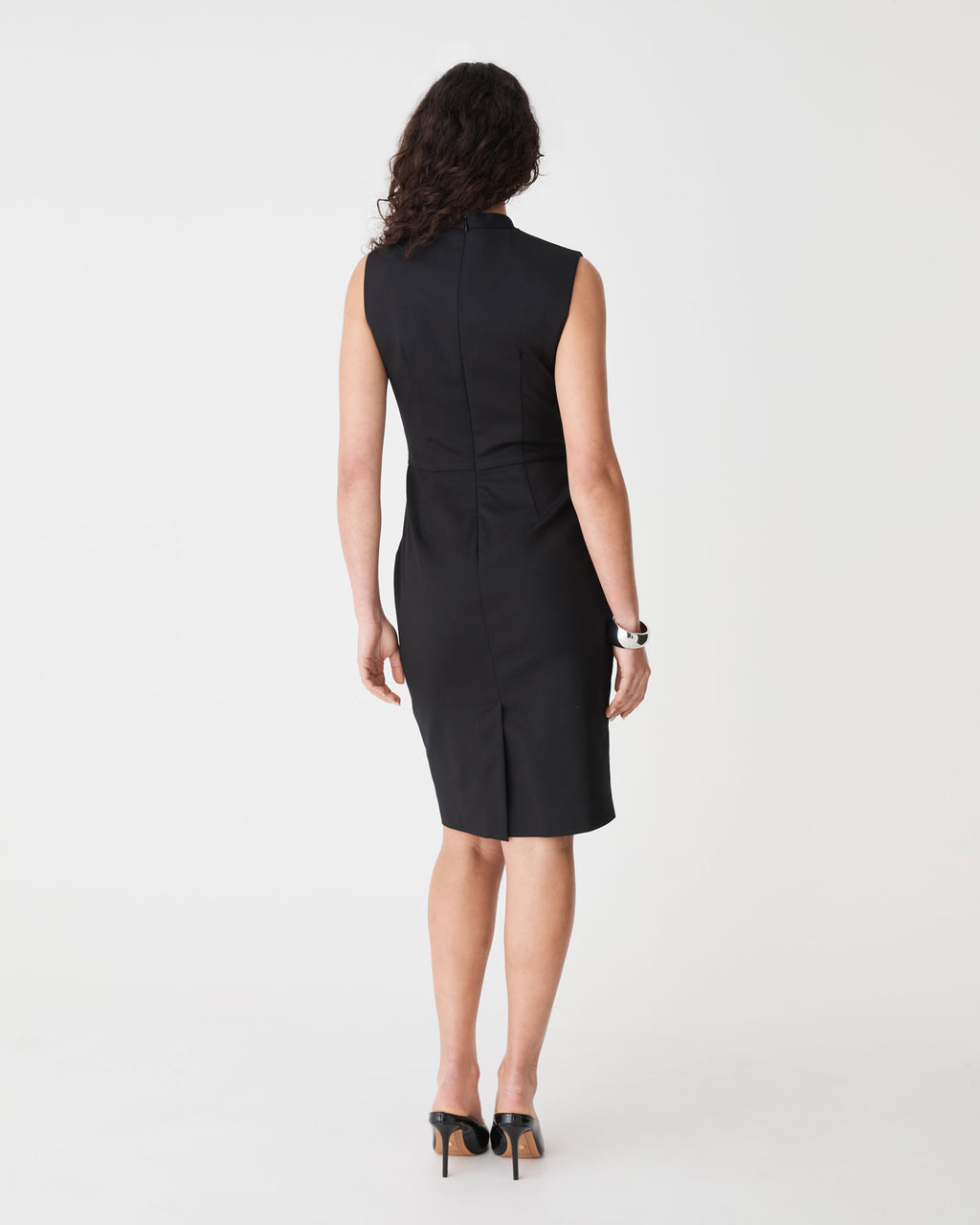 Fiona Asymmetric Pencil Dress in black — back view