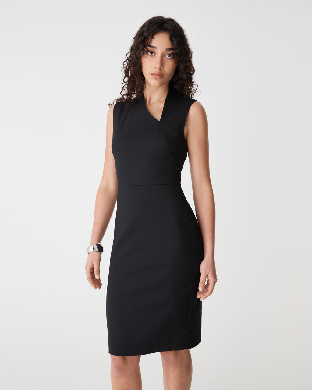 Fiona Asymmetric Pencil Dress in black — close-up view