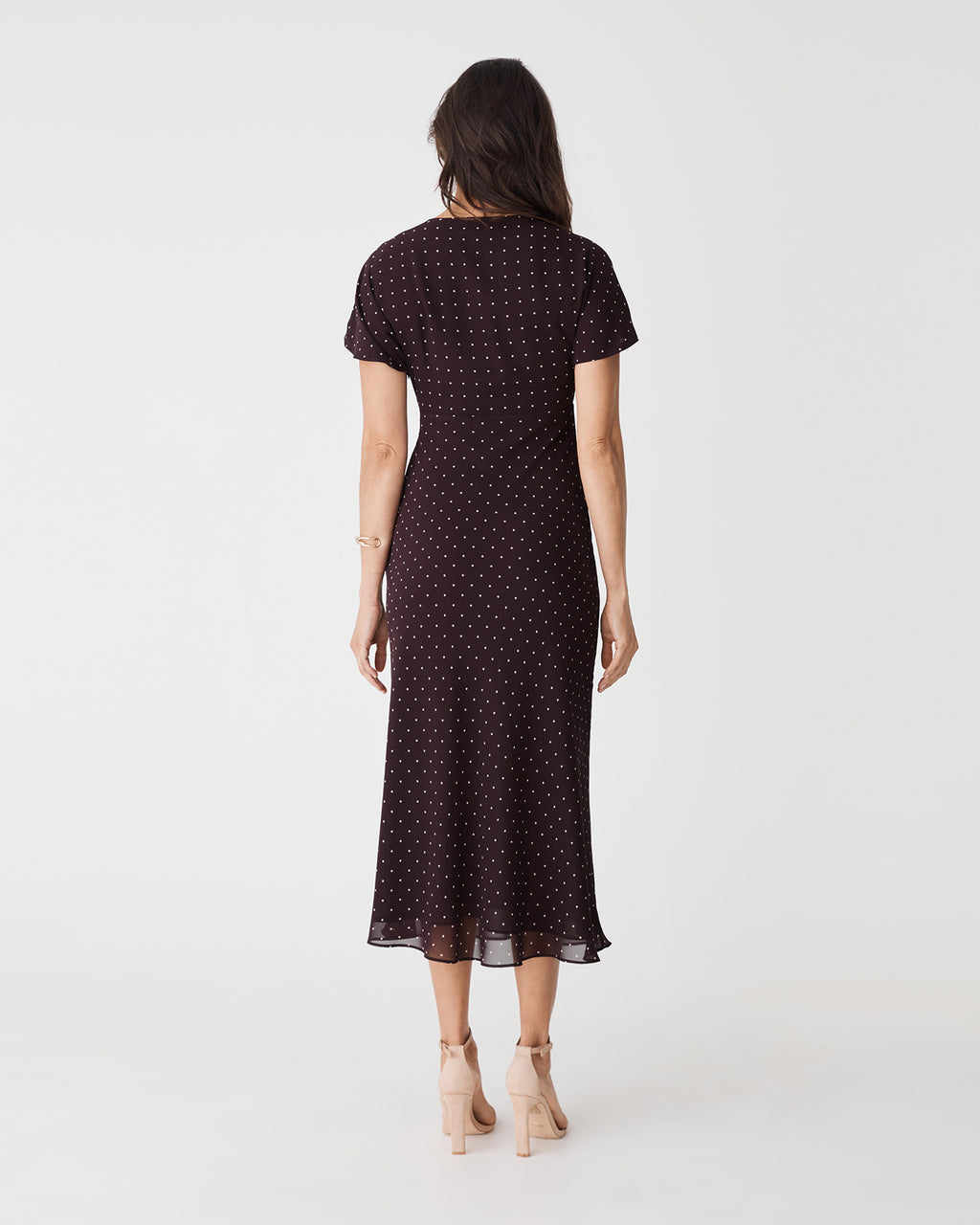 Elise V-Neck Bias Dress in chocolate dot — back view