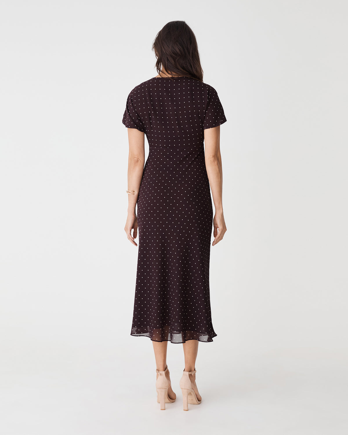 Elise V-Neck Bias Dress in chocolate dot — back view