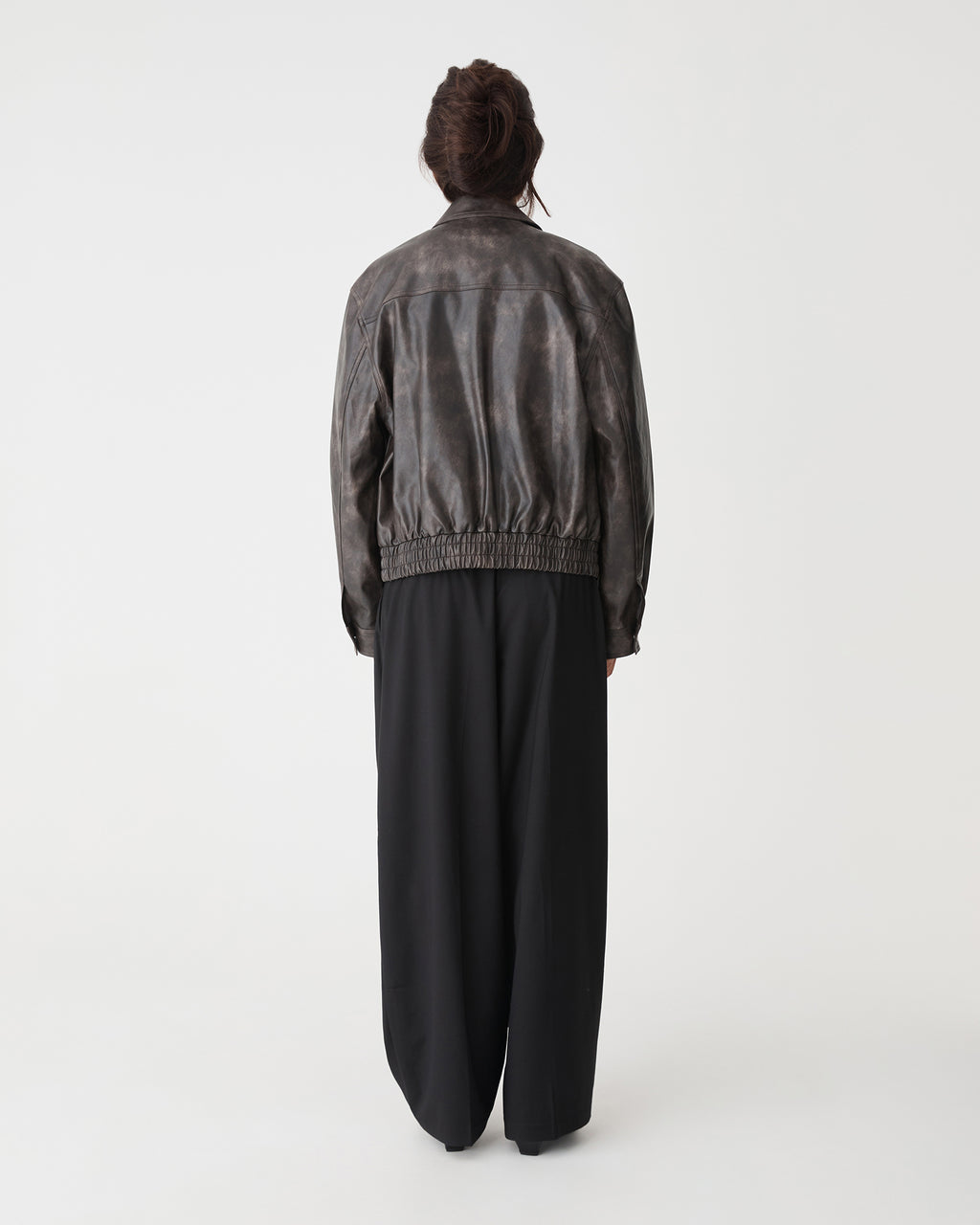 Ada Faux Leather Bomber Jacket in dark brown — back view