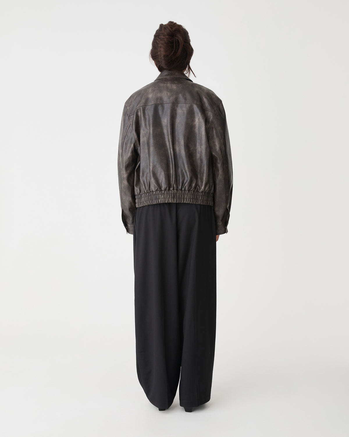 Ada Faux Leather Bomber Jacket in dark brown — back view