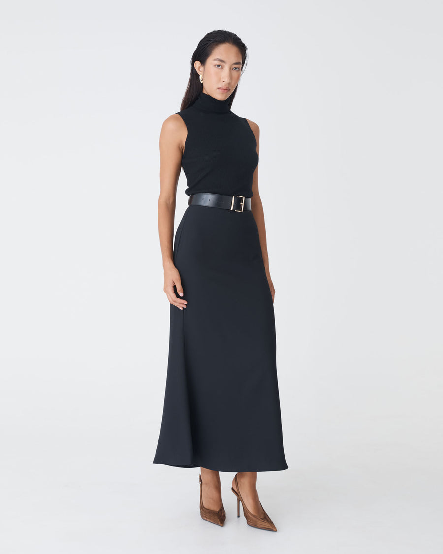 Suzie Turtleneck Rib Knit Top in black — full-length view