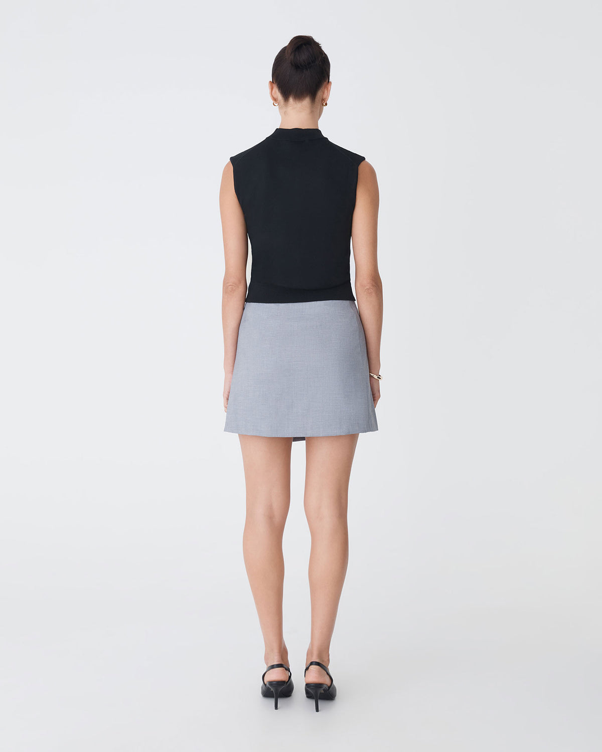 Dina Mock Neck Knit Top in black — back view