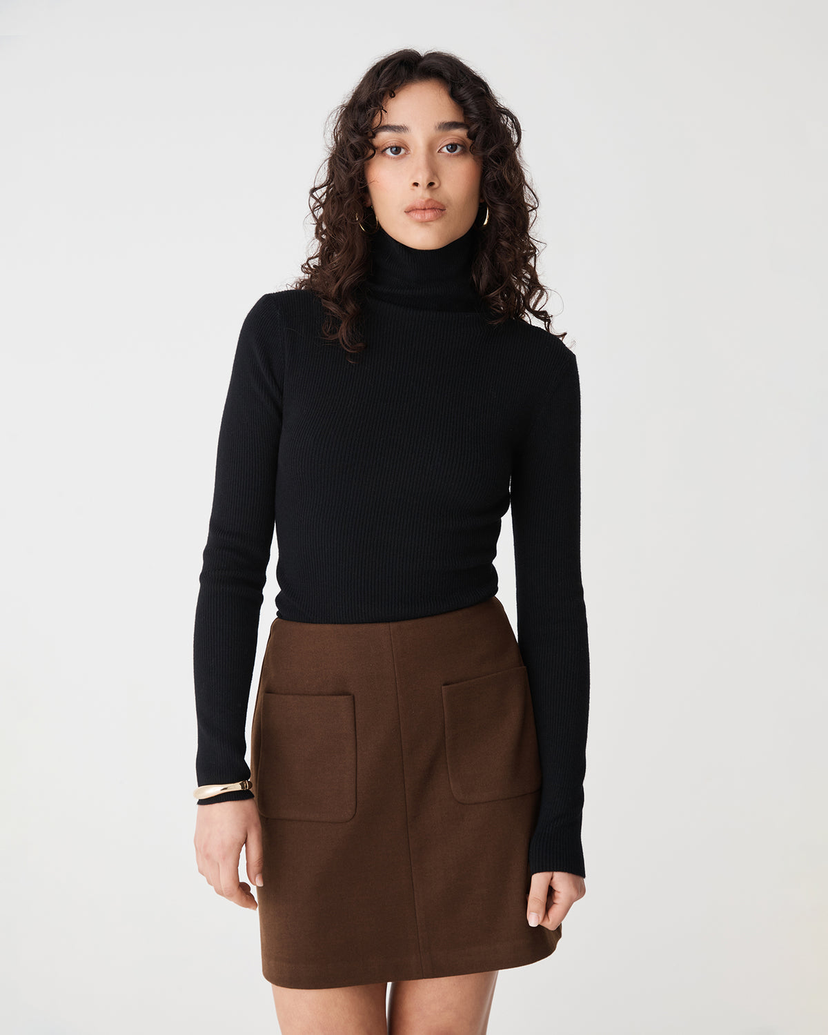 Ginny Ribbed Turtleneck Knit in black — close-up view