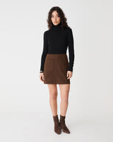 Ginny Ribbed Turtleneck Knit in black — full-length view