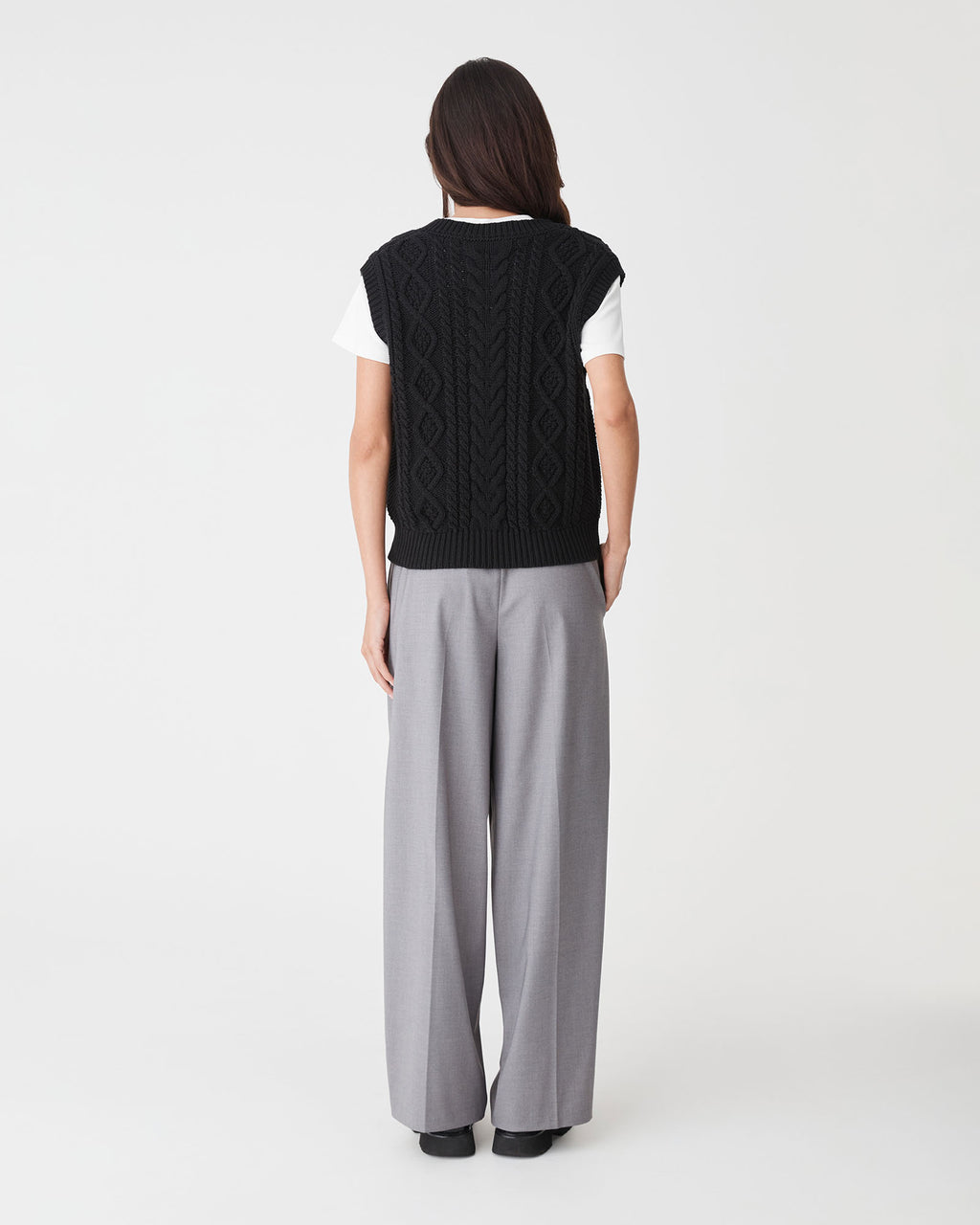 Poppy Sleeveless Cable Knit in black — back view