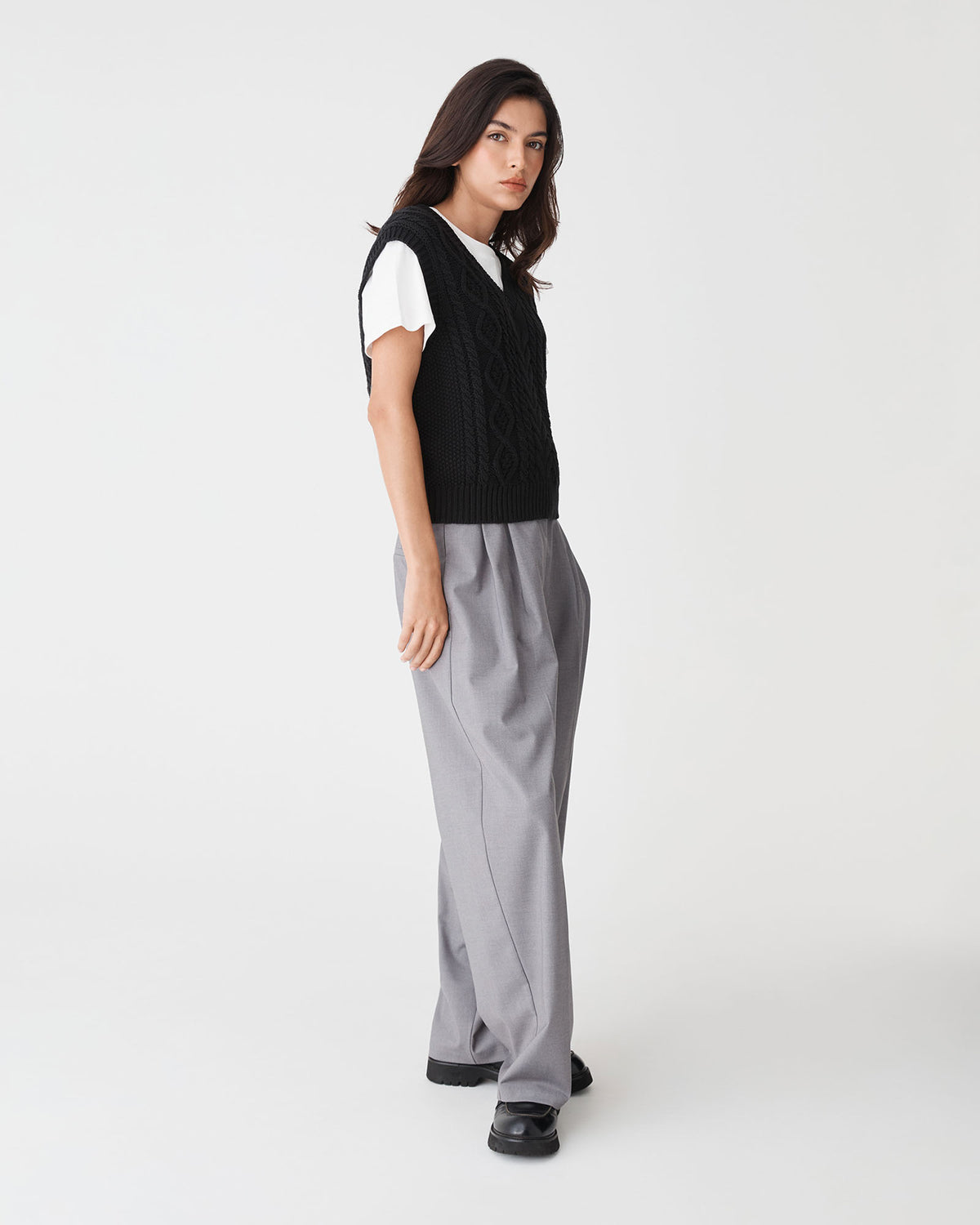 Poppy Sleeveless Cable Knit in black — side view