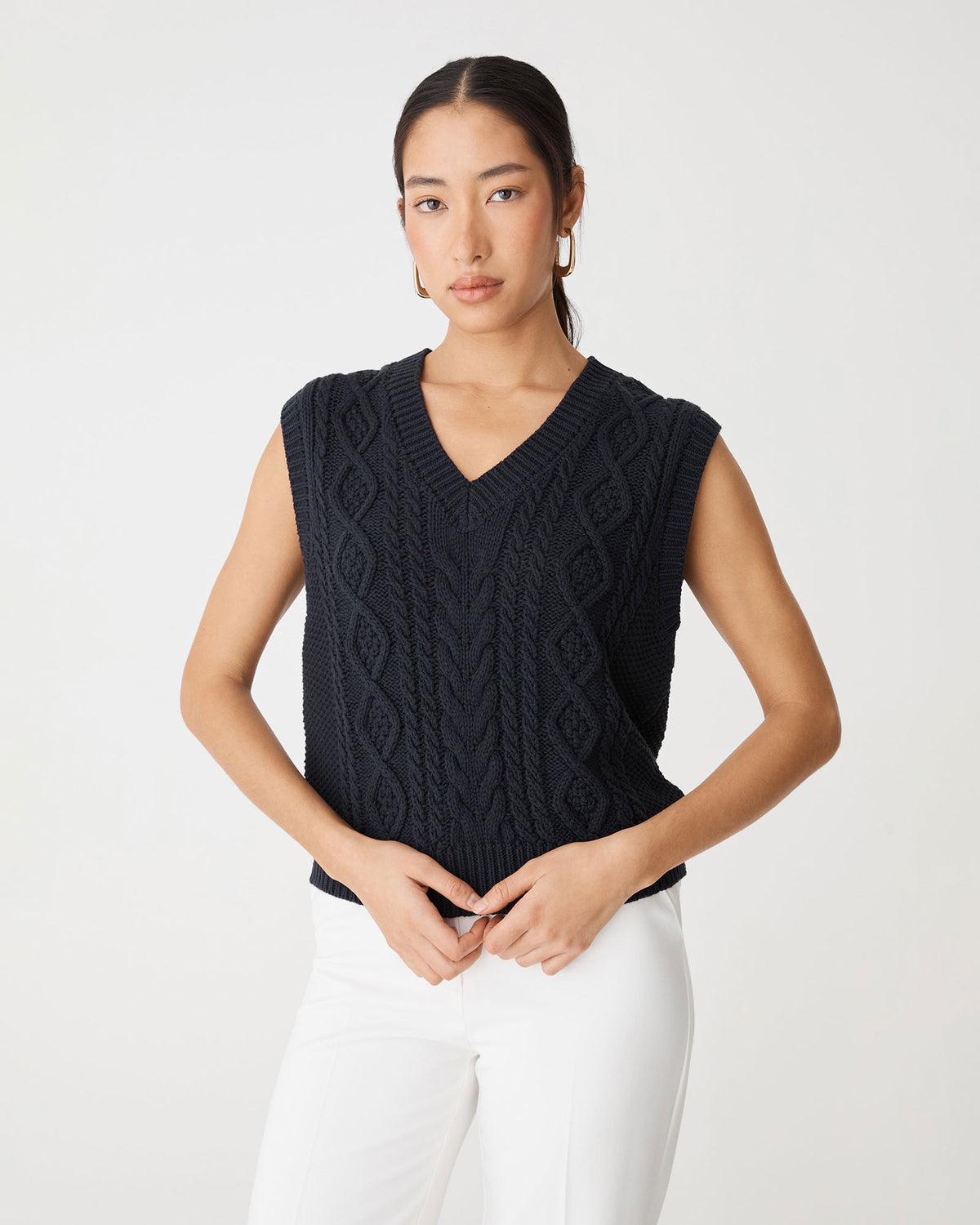 Poppy Sleeveless Cable Knit in midnight — close-up view