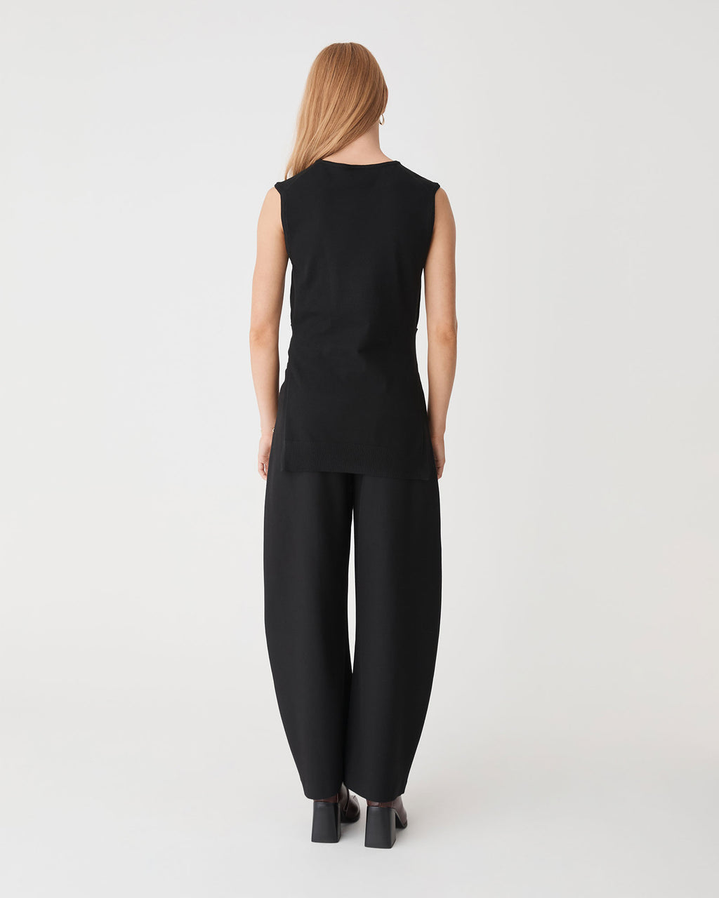 Nora Sleeveless Tie Waist Knit in black — back view