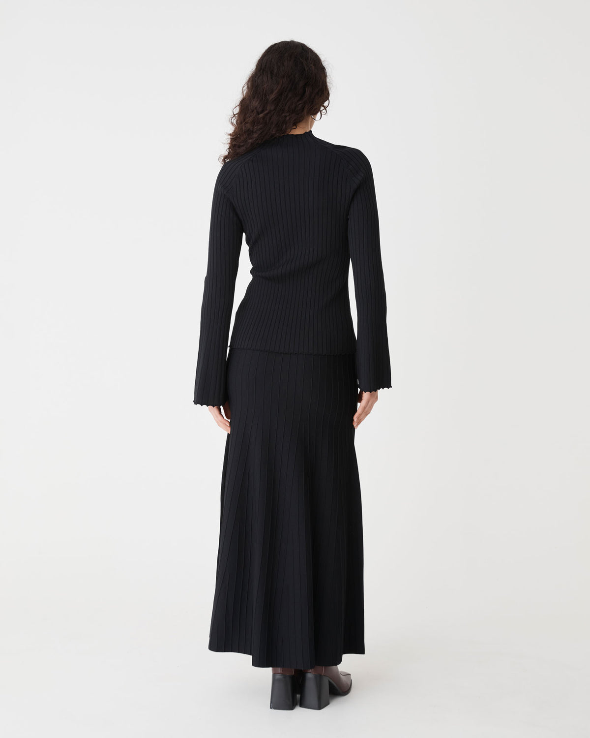 Nevaeh Bell Sleeve Knit in black — back view