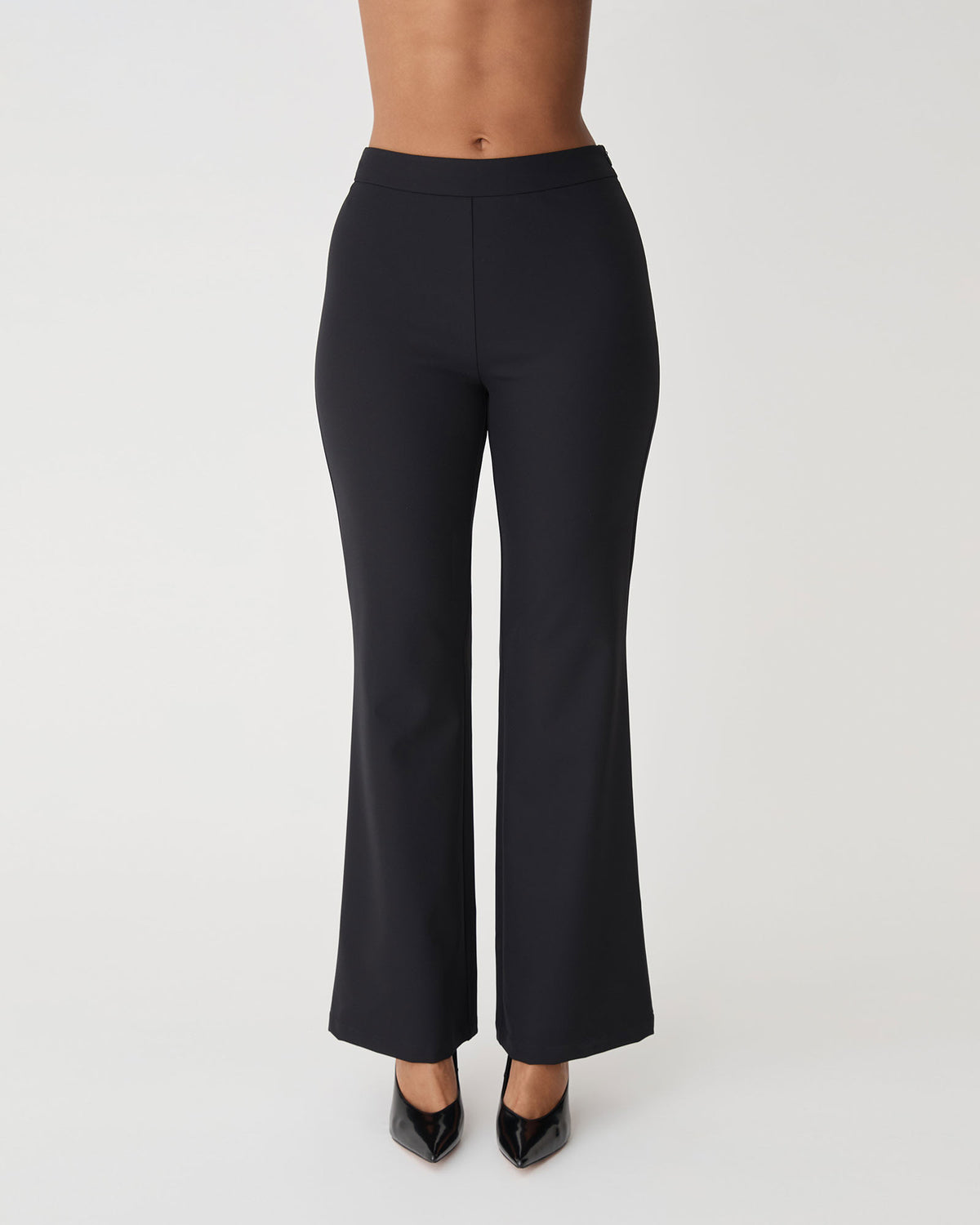Thea Bootleg Pants in black — close-up view
