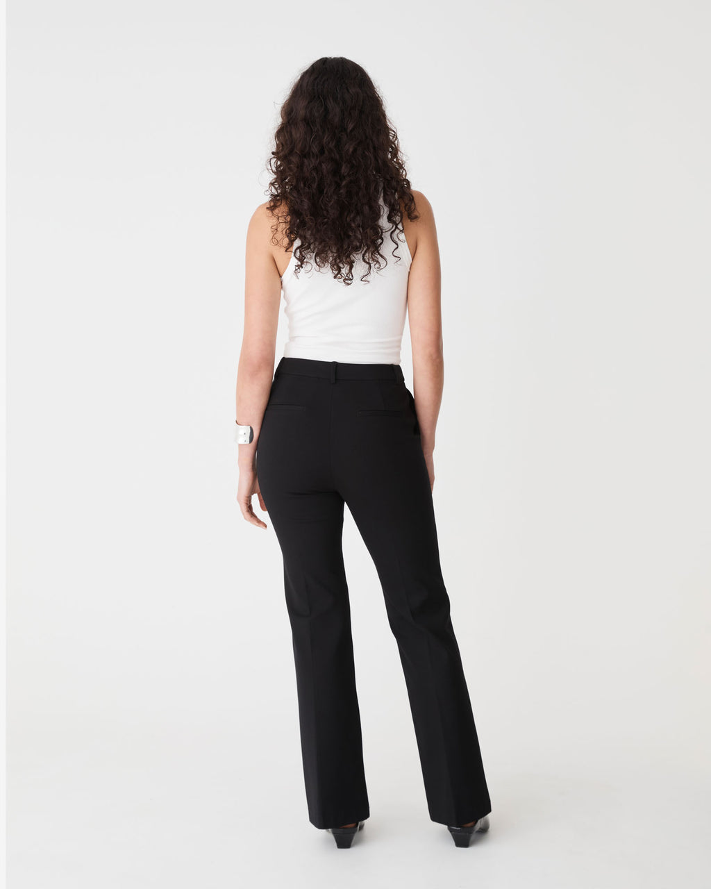 Sutton Bootcut Ponte Pants in black — back view
