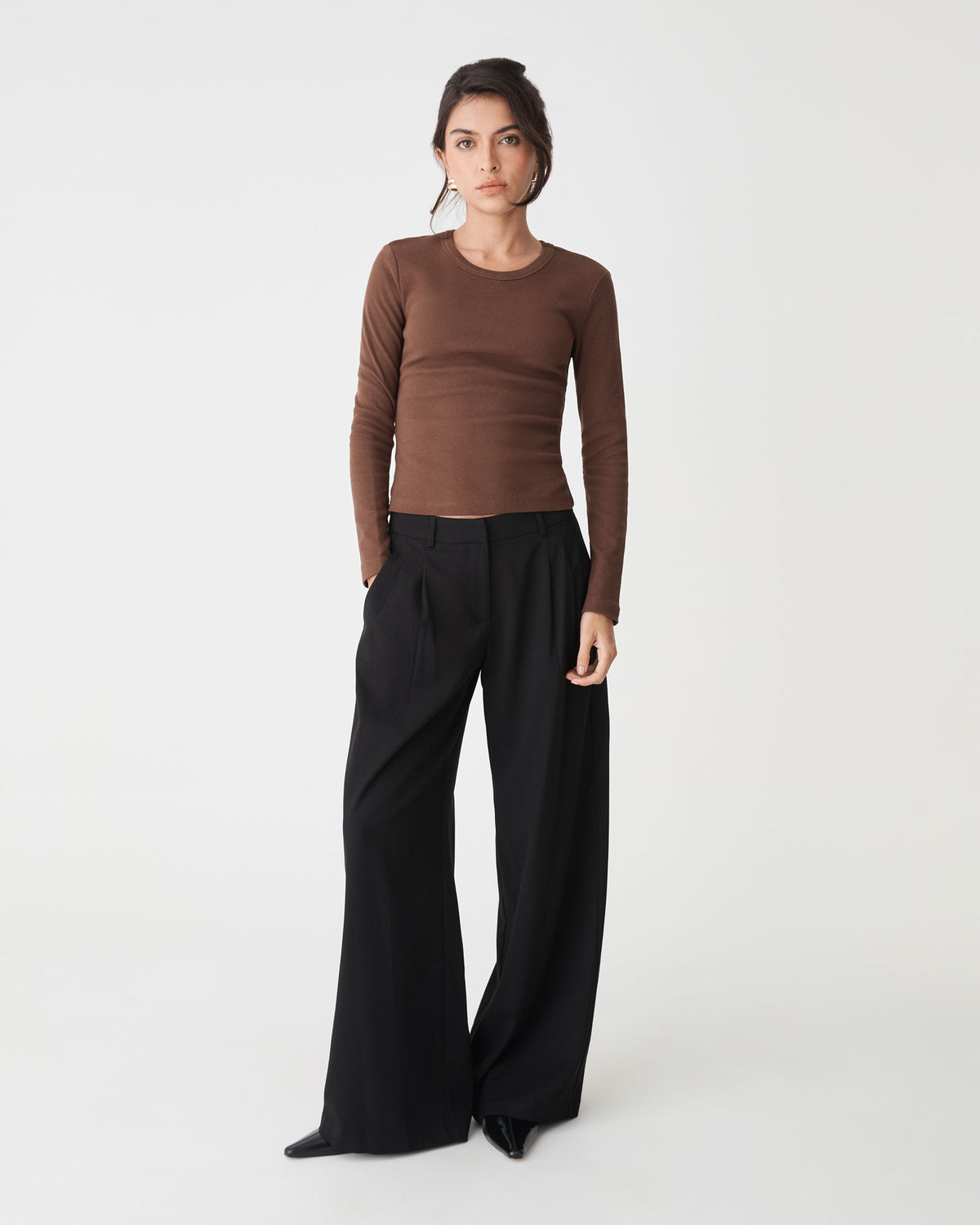 Arden Mid Rise Pleated Pants in black — full-length view