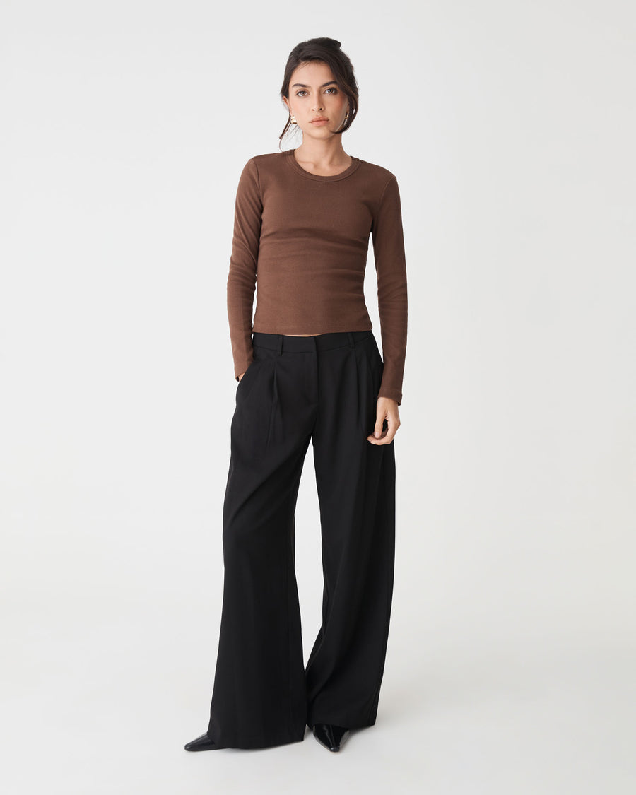 Arden Mid Rise Pleated Pants in black — full-length view