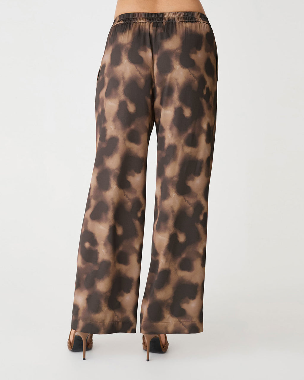 Savanna Printed Satin Pants in brown abstract — back view