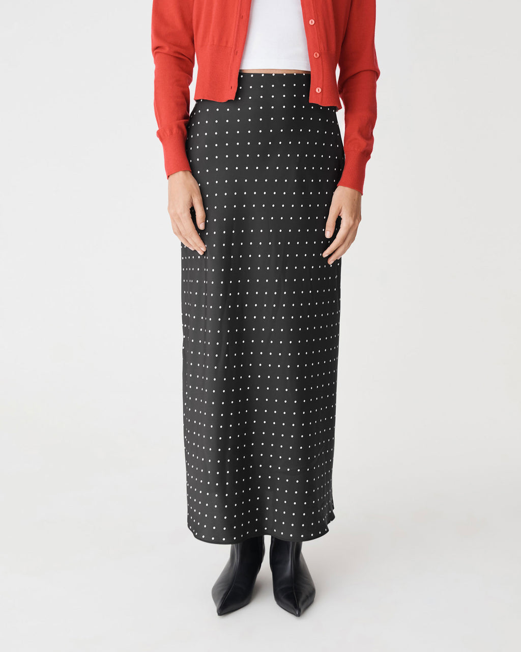 Courtney Bias Satin Skirt in black white dot — close-up view