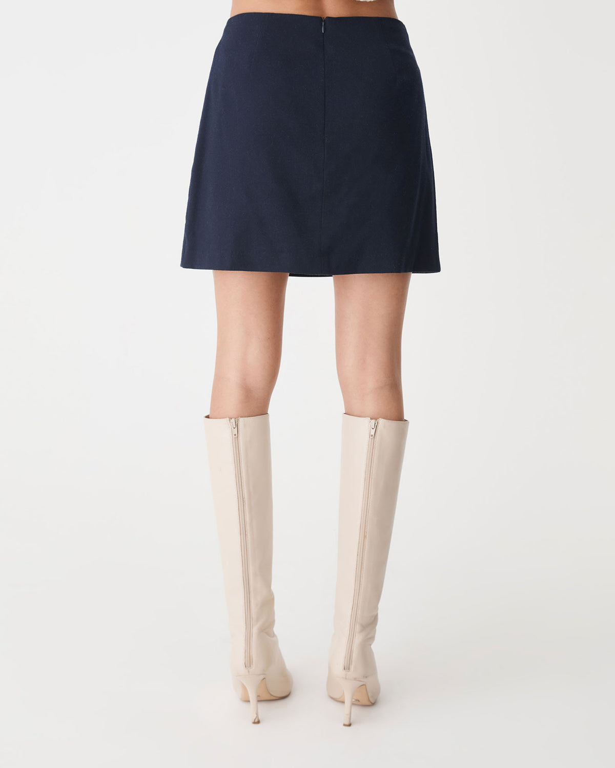 Dale Mini Skirt in dark navy — back view