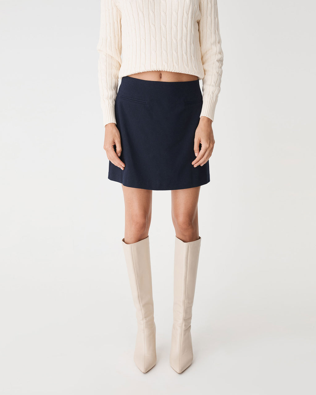 Dale Mini Skirt in dark navy — close-up view