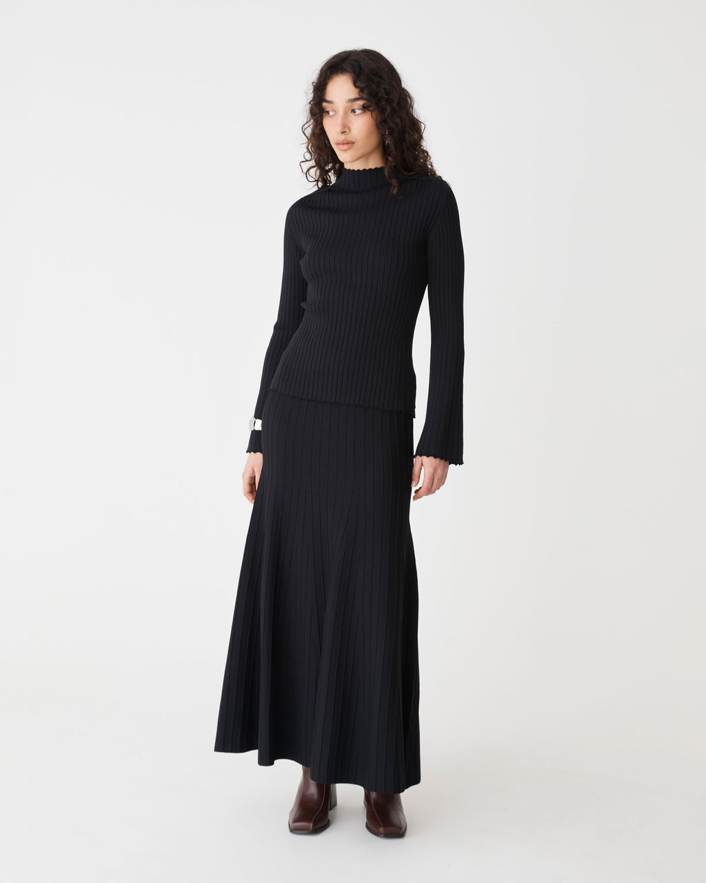 Nevaeh A-Line Knit Skirt in black — full-length view