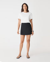 Jennifer Tailored Mini Skort in black — full-length view