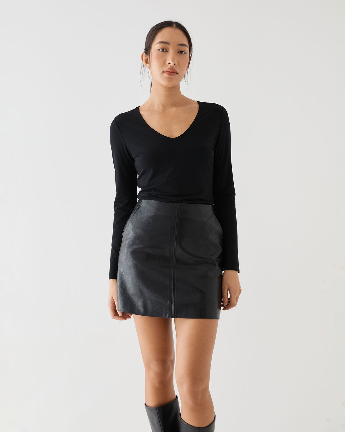 Shay Faux Leather Mini Skirt in black — close-up view