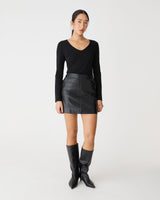 Shay Faux Leather Mini Skirt in black — full-length view