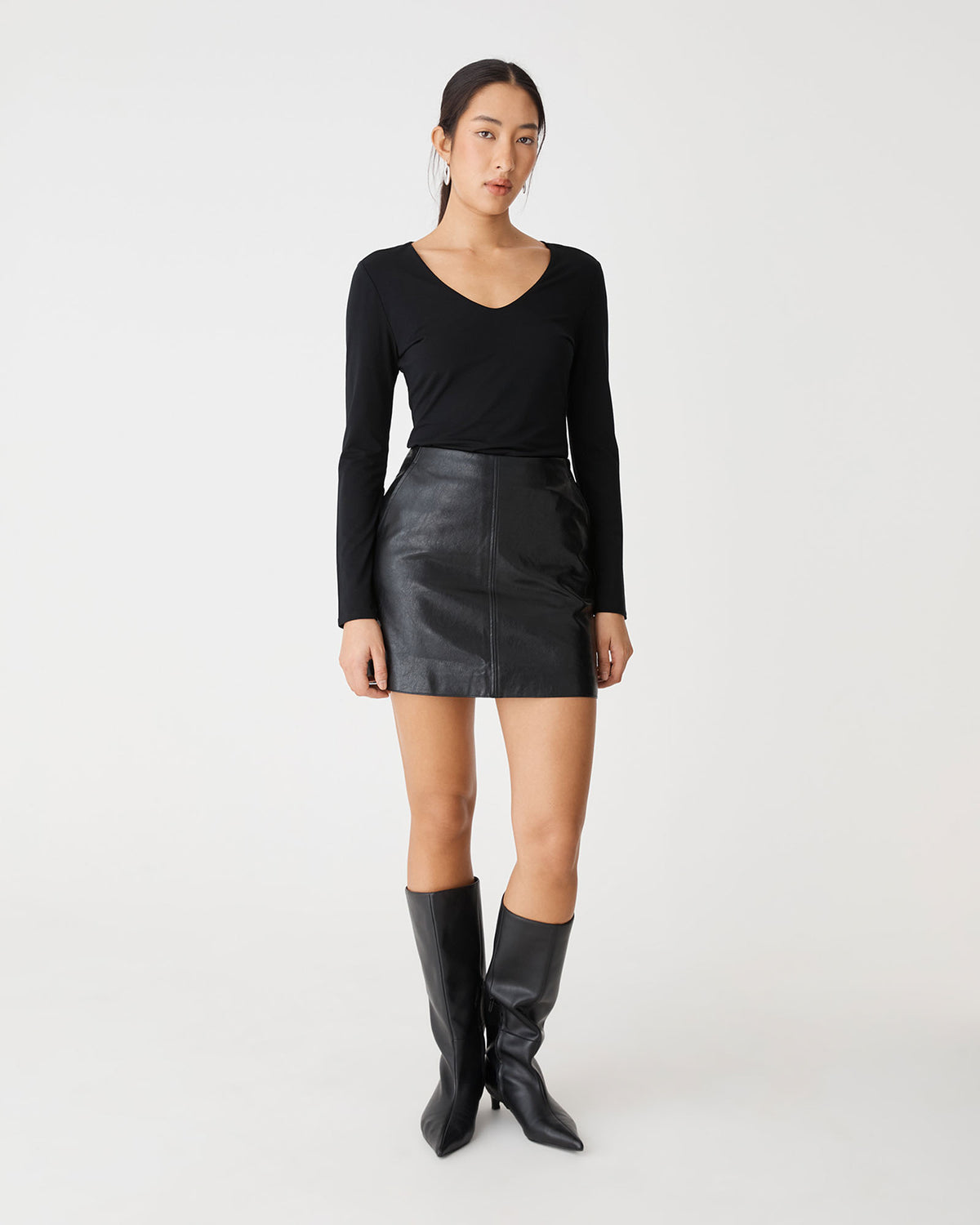 Shay Faux Leather Mini Skirt in black — full-length view