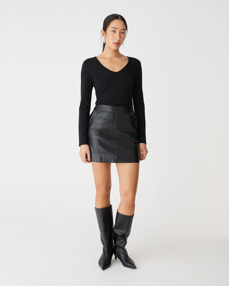 Shay Faux Leather Mini Skirt in black — full-length view