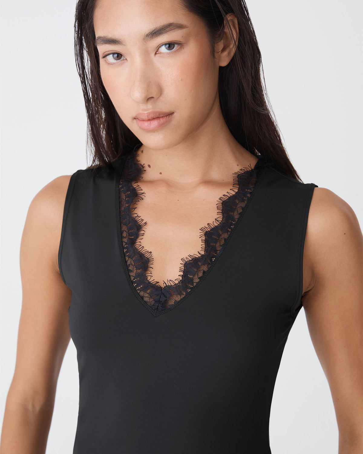 Greer Lace Trim Cami in black — fabric detail