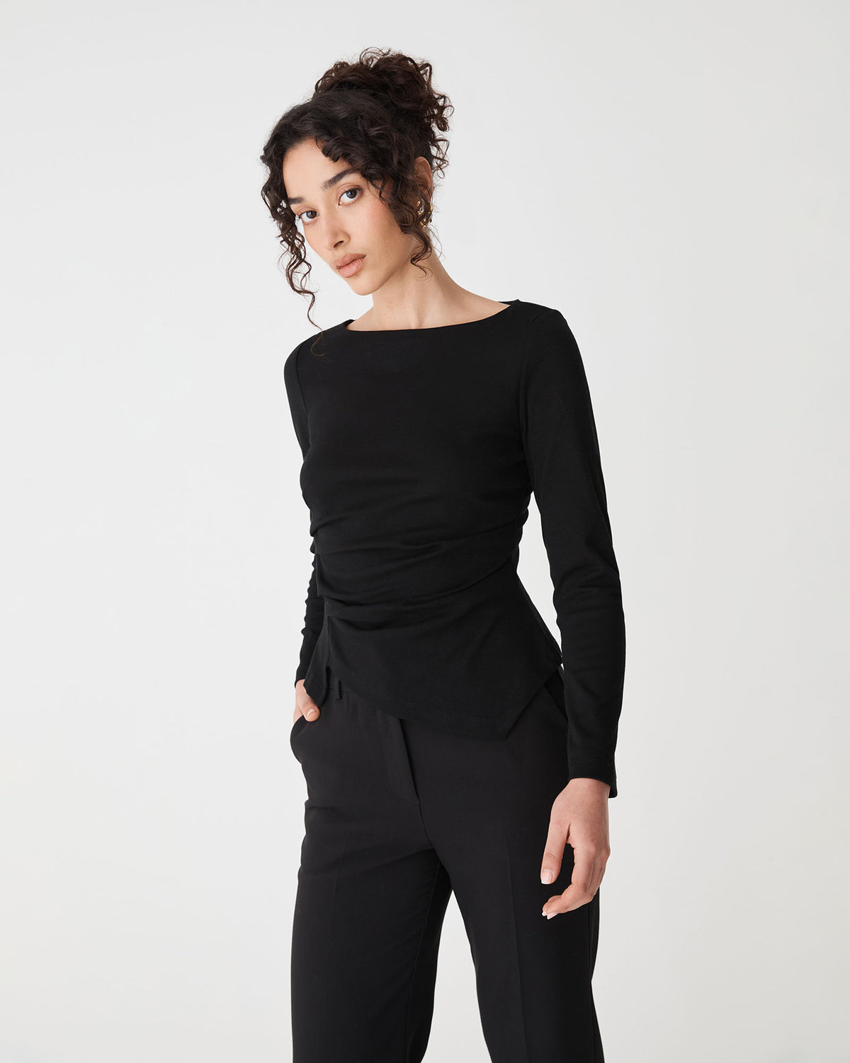 Calia Asymmetric Knit Top in black — close-up view 2