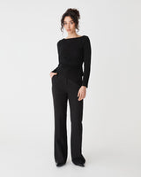 Calia Asymmetric Knit Top in black — full-length view